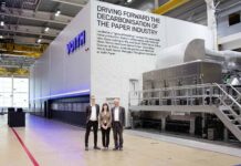 ESSITY OPERATIONS REPORT: Driving forward the decarbonisation of the paper industry Aiming to drive a completely new, scalable decarbonisation process across the global paper industry: (L-r) Jonas Bergström, Elena Viviani, and Matthias Höhsl in front of the pilot installation at Voith in Heidenheim, Germany