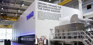 ESSITY OPERATIONS REPORT: Driving forward the decarbonisation of the paper industry Aiming to drive a completely new, scalable decarbonisation process across the global paper industry: (L-r) Jonas Bergström, Elena Viviani, and Matthias Höhsl in front of the pilot installation at Voith in Heidenheim, Germany